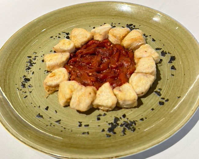 Plato de merluza rebozada